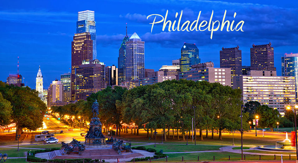 American International Tours Photo of Philadelphia PNG Image of the Ben Franklyn Parkway taken from the steps of the Philadelphia Museum of Art at dusk.