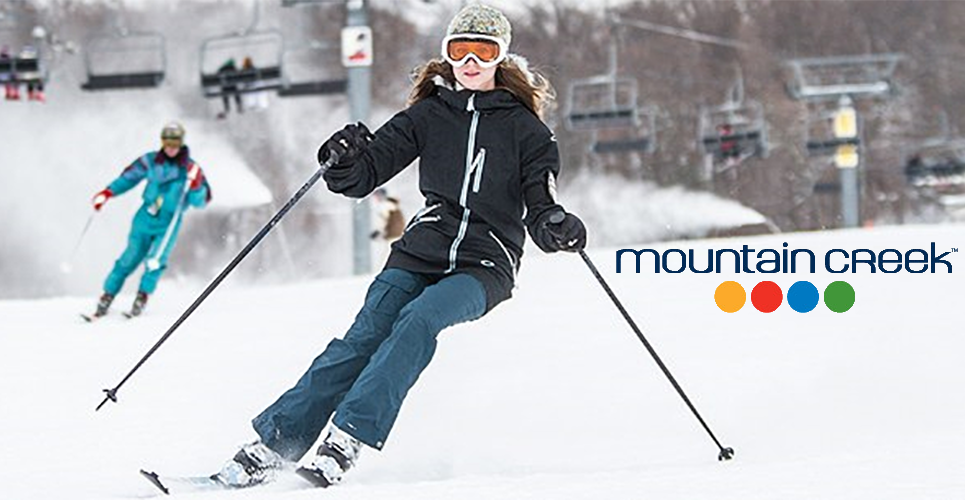 American International Tours Ski Mountain Creek Photo PNG Image of Skiing at Mountain Creek with logo.