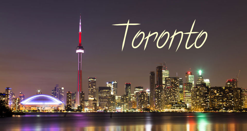 American International Tours Photo of Toronto, Canada PNG Image of the Toronto, Canada Skyline taken at dusk.